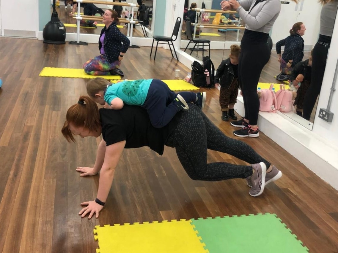 Mams exercising together at a Fitness and Play class in South Tyneside