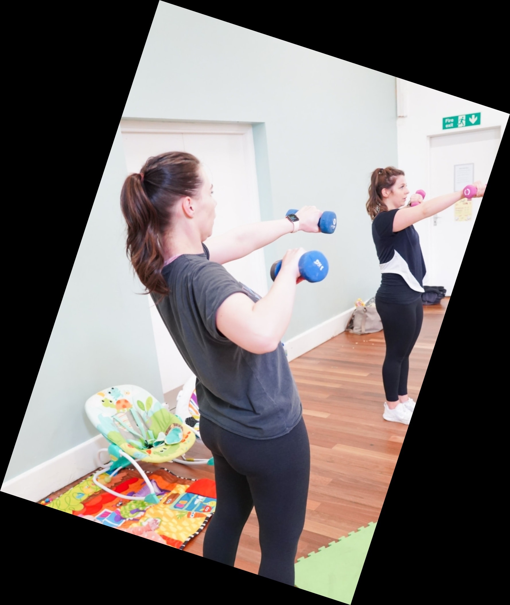 Toddlers playing happily while mams exercise at Fitness and Play